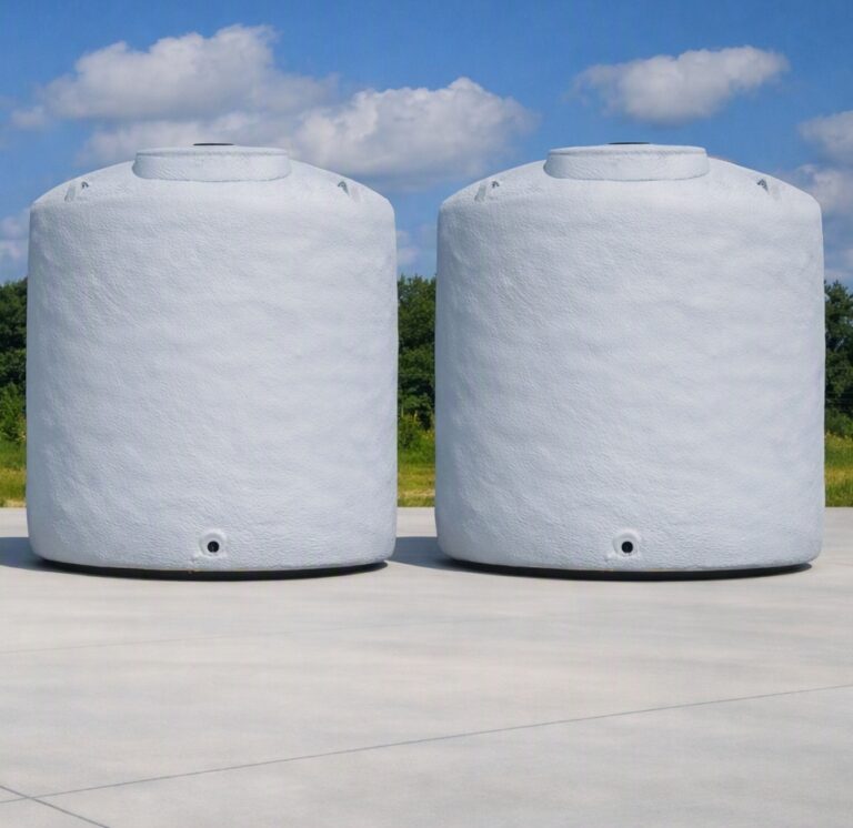 Insulated 10,500-gallon HDPE vertical tanks.